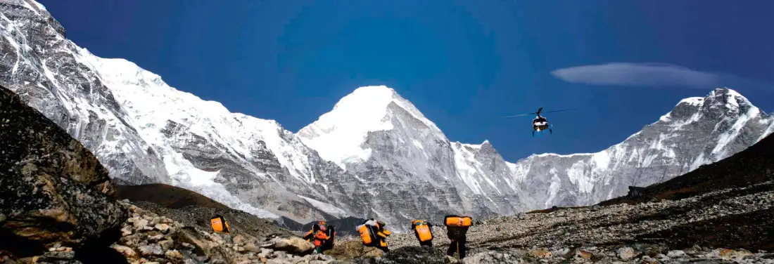 Porters on the trail below Pumori