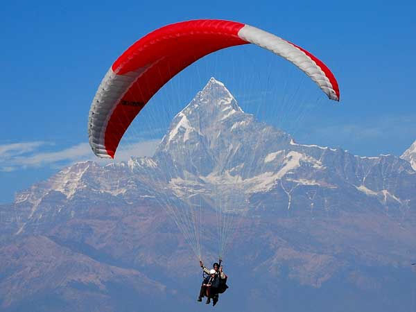 Paragliding over the Himalayas in Nepal